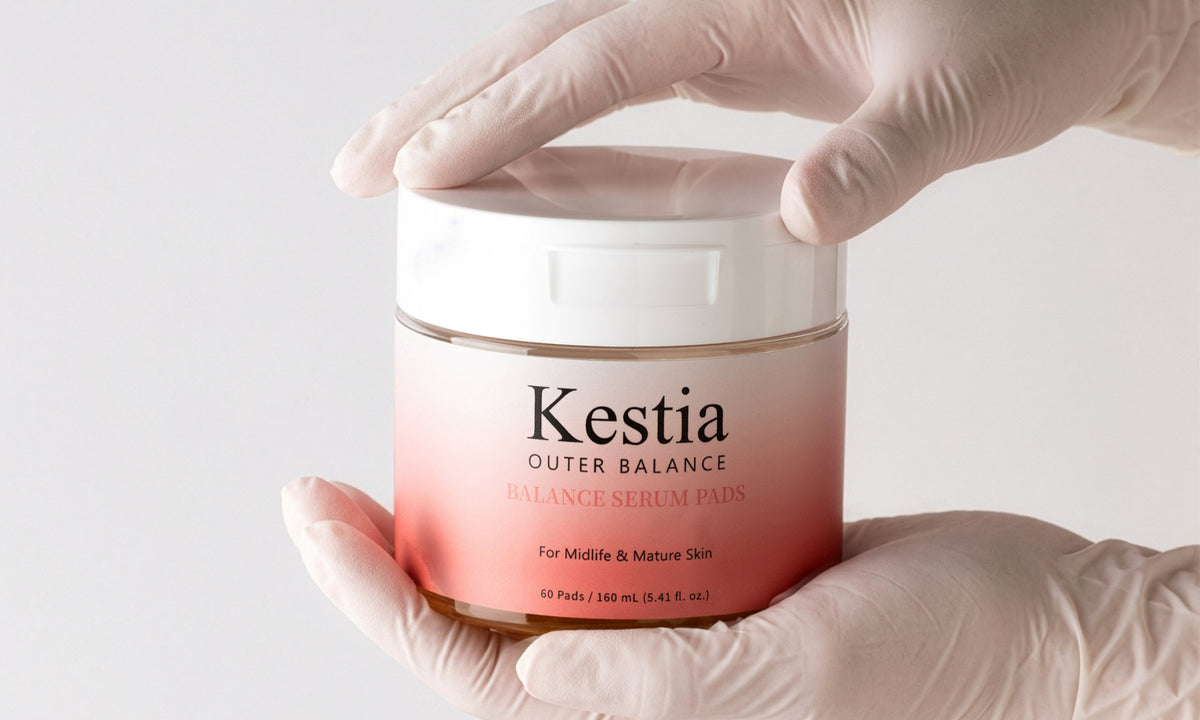 Kestia Balance Serum Pads jar held in hand